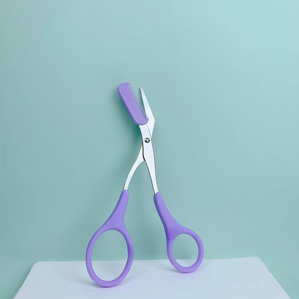 Eyebrow trimming scissors with built-in comb