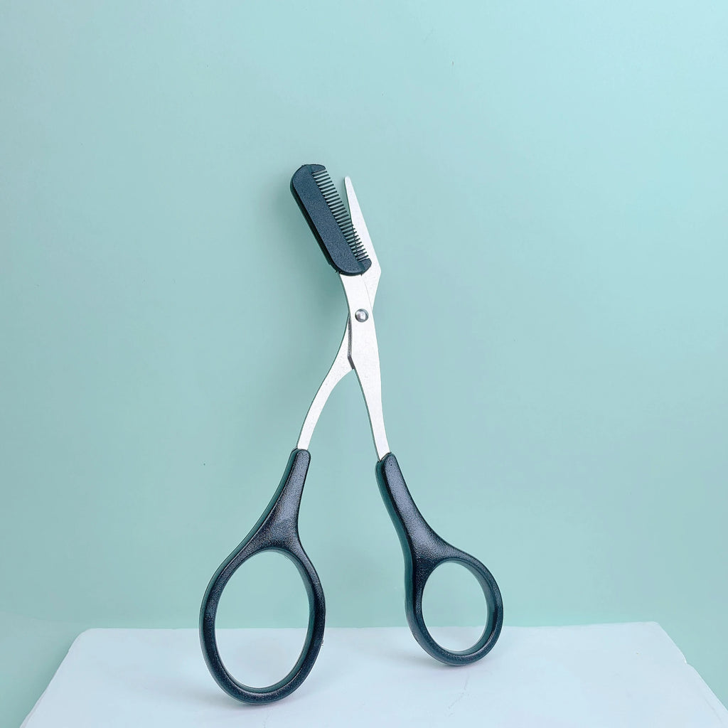 Eyebrow trimming scissors with built-in comb